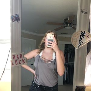 Light brown top with cross design